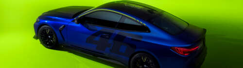 Una BMW M4 CS Edition elegante, con una livrea e degli adesivi gialli e neri ispirati... Dual UHD