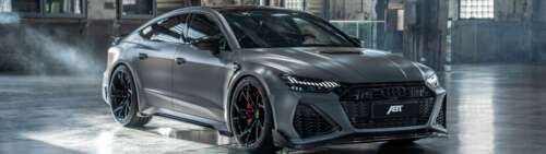 Un’elegante berlina Audi RS7 ad alte prestazioni, con una carrozzeria metallizzata... Dual UHD