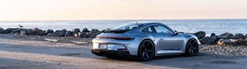 Una Porsche GT3 RS, un’auto sportiva ad alte prestazioni caratterizzata da un design... Dual UHD