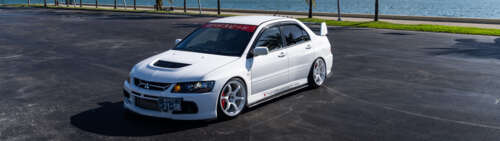 La potente Mitsubishi Lancer Evolution IX, una berlina sportiva, immortalata in una... Dual UHD