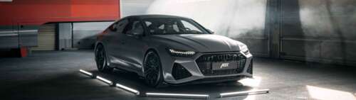 Un’Audi RS7, lussuosa auto sportiva ad alte prestazioni, caratterizzata da un design... Dual UHD