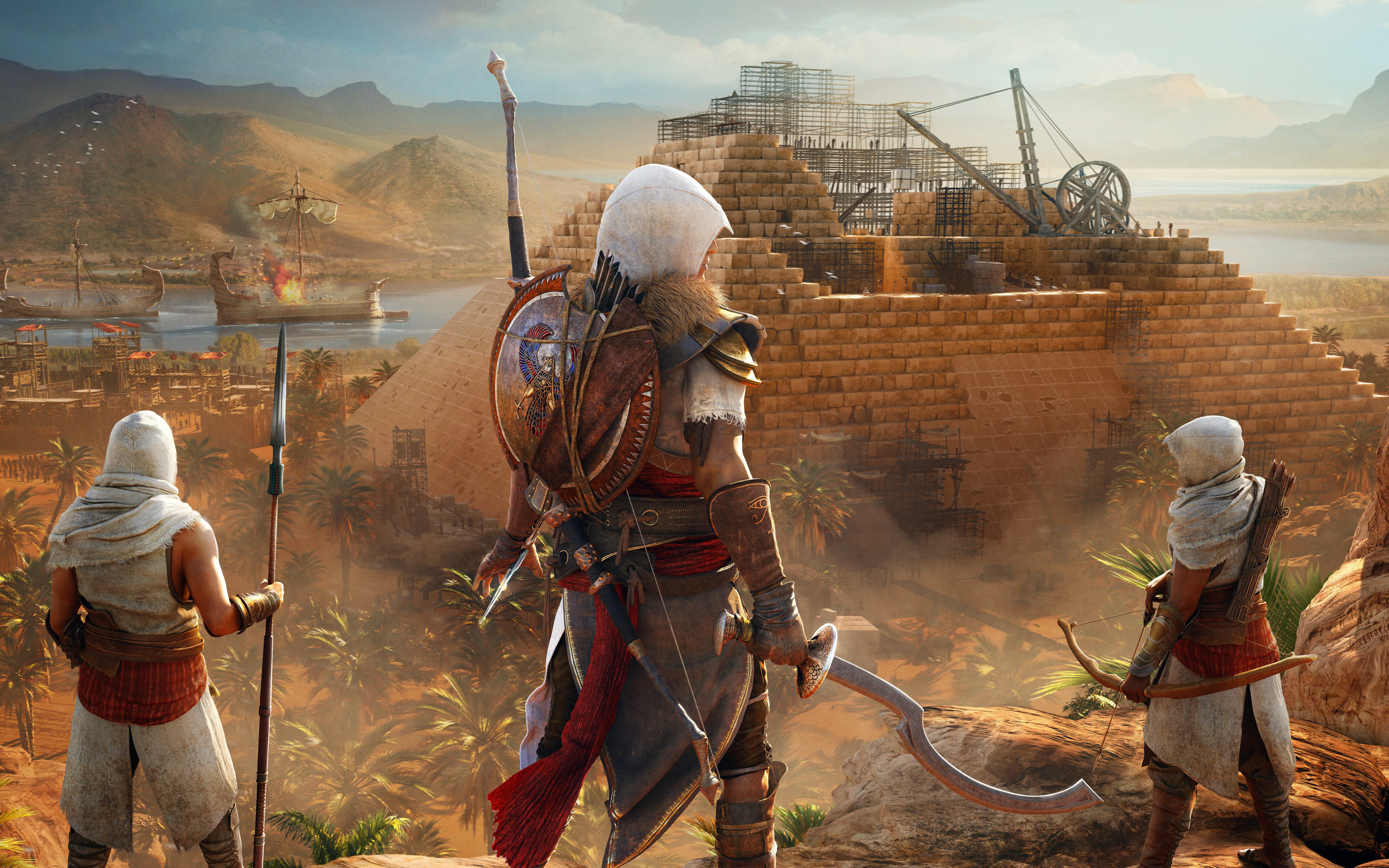 Bayek di Siwa, personaggio del videogioco Assassin's Creed Origins, in posa in un paesaggio dell'antico Egitto.