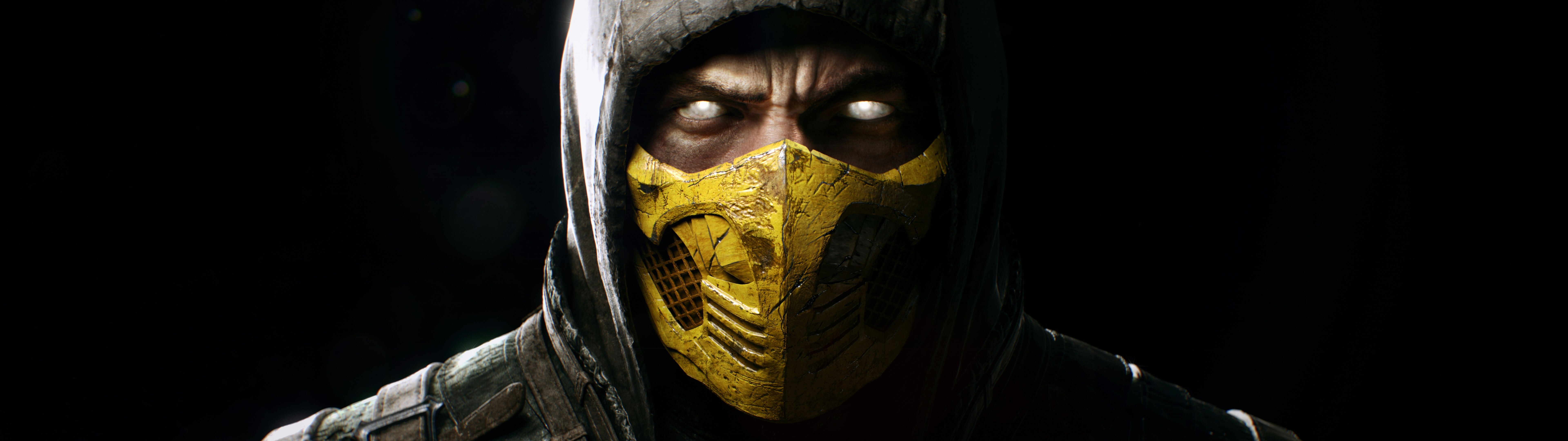 Scorpion, personaggio del videogioco Mortal Kombat, indossa la sua iconica armatura e maschera da ninja gialla.