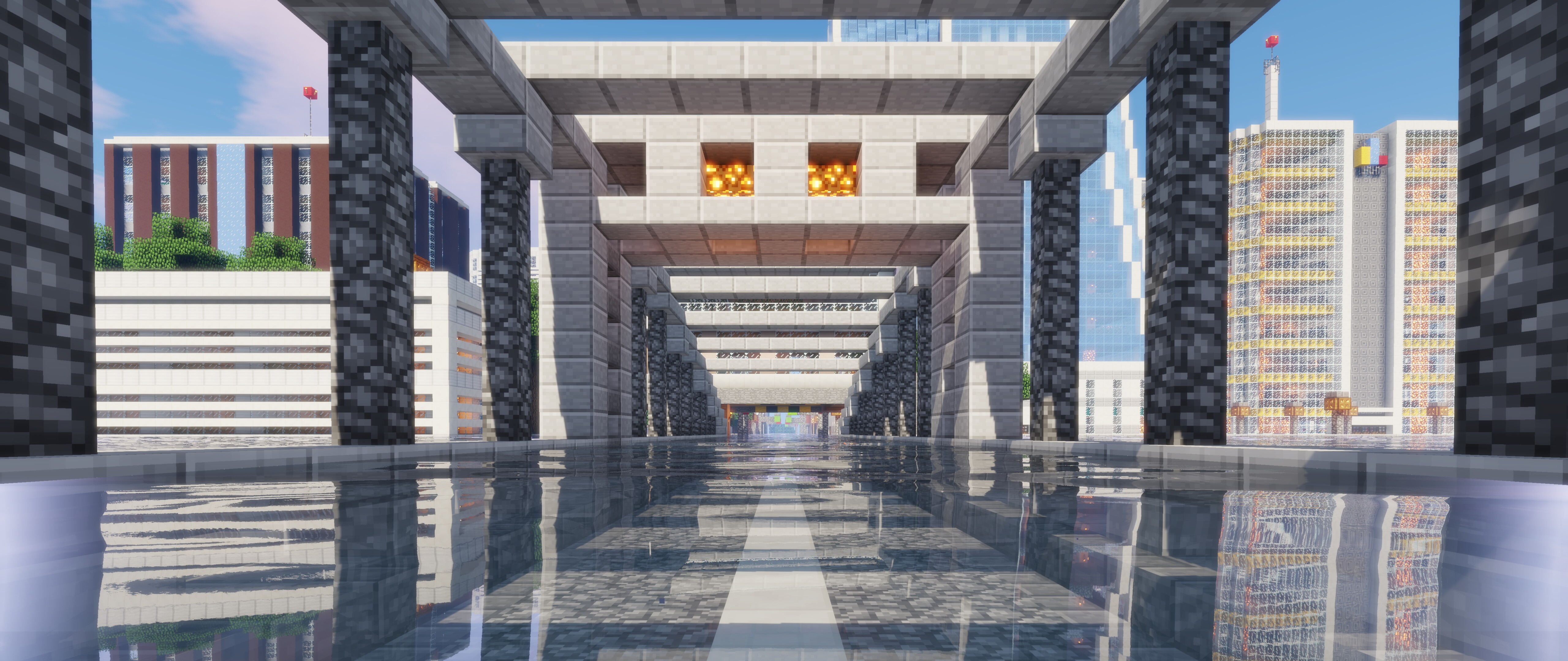 Il personaggio Steve, proveniente dal videogioco Minecraft, è in piedi in un suggestivo paesaggio caratterizzato da elementi squadrati e montagne.